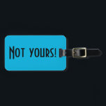 Not Yours Luggage Tag<br><div class="desc">This Not Yours luggage tag is a clever way to tell the people at the luggage carousel to keep looking. It features a vibrant,  blue background and bold,  black lettering that reads,  "Not yours!" The opposite side is ready for customizing.</div>