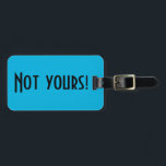 Not Yours Luggage Tag<br><div class="desc">This Not Yours luggage tag is a clever way to tell the people at the luggage carousel to keep looking. It features a vibrant,  blue background and bold,  black lettering that reads,  "Not yours!" The opposite side is ready for customizing.</div>
