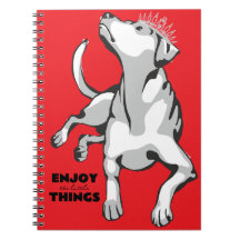 Notebook with image of white dog with red backgrou