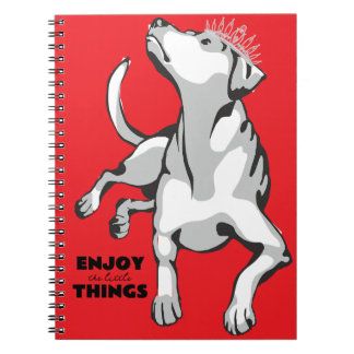Notebook with image of white dog with red backgrou