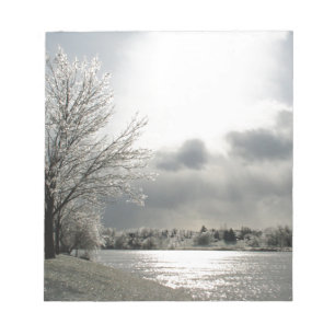 notepad with photo of icy winter landscape