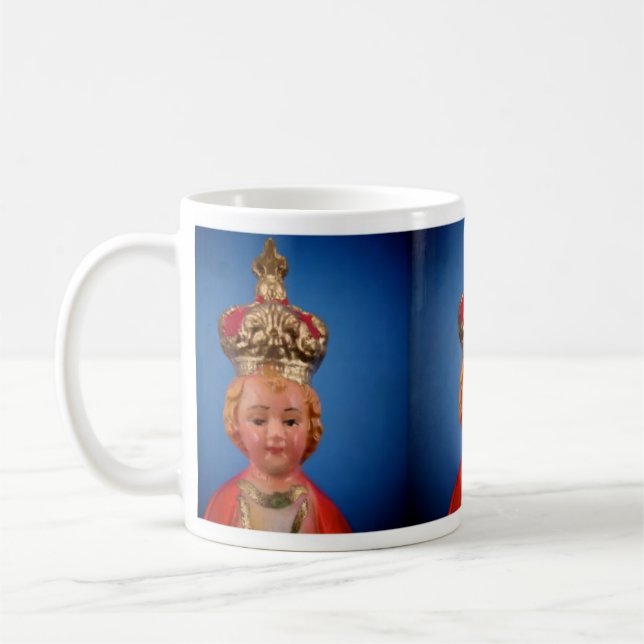 Nourrisson de tasse de Prague (Gauche)
