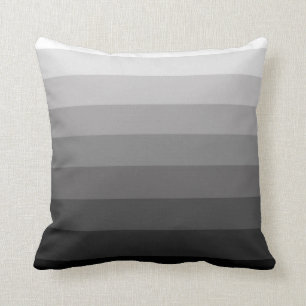 Nuances de coussin gris de motif de rayure
