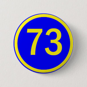 number, 73, in a circle 2 inch round button
