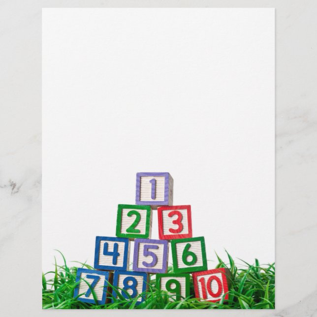 Number blocks stacked on grass (Front)