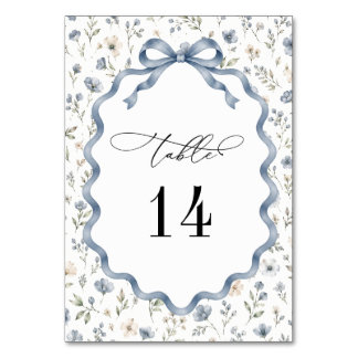 Numéro de table de mariage avec nœud papillon fleu