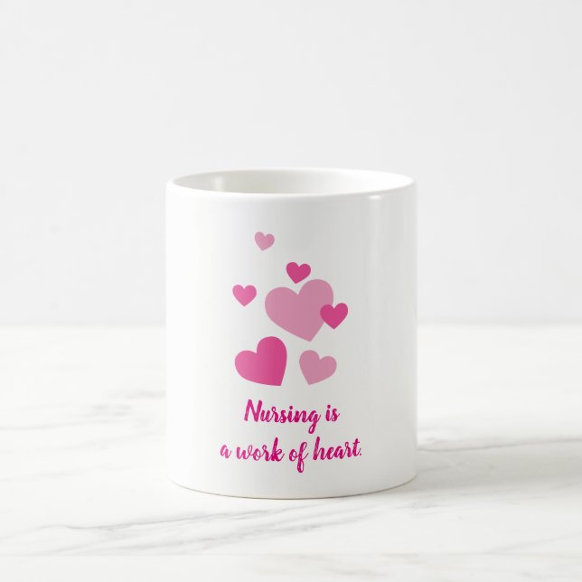 Nursing is a work of heart pink design coffee mug (Center)