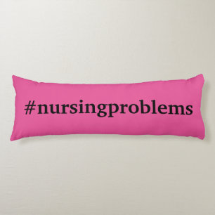 #nursingproblems on pink body pillow