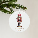 Nutcracker pink white simple Christmas Metal Ornament<br><div class="desc">White background,  and a pink nutcracker.  Personalize and add a name and year.</div>