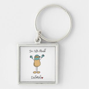 Nuts About Doctoring T-shirts and Gifts Keychain