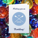 Oar inspiring slogan and crossed oars birthday card<br><div class="desc">Humourous "awe-inspiring" slogan for a special birthday card for a rower or sculler. The text is in capital letters,  with crossed blades in white on a blue circular badge. Inside,  the greeting is customizable,  or you can use the provided "Have a gr-eight day and an oar-full lot of fun!"</div>