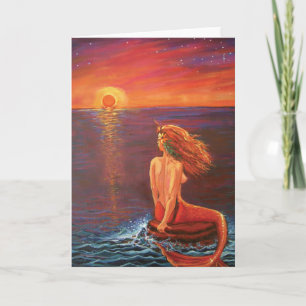 Observant le coucher du soleil - carte de voeux