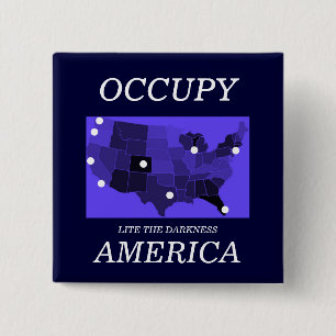 OCCUPY AMERICA LITE THE DARKNESS 2 INCH SQUARE BUTTON