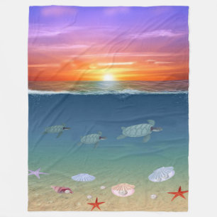 Ocean Sunrise and Swimming Sea Turtles Fleece Blanket