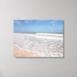 Ocean Waves Covering The Sand On The Beach Canvas Print