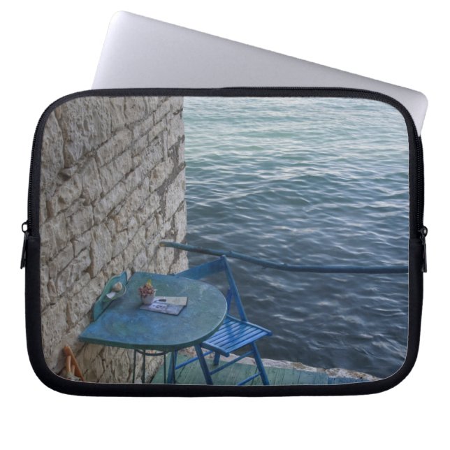 Oceanside seating for two at tiny outdoor cafe, laptop sleeve (Front)