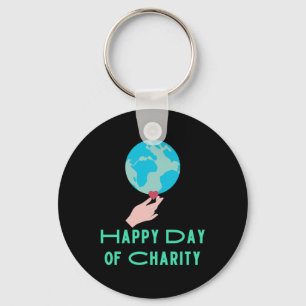 Of International Day Of Charity Sticker Keychain