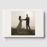 Off White Foil Guest Book Simple Photograph<br><div class="desc">A timeless keepsake wrapped in shimmer. This off-white guest book features delicate foil accents that add a touch of luxury to your wedding day. Designed to complement romantic, minimalist, or modern themes, it offers space for heartfelt messages, warm wishes, and lasting memories from your guests. Whether displayed at your welcome...</div>