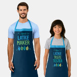 Official Latke Maker Hanukkah Apron<br><div class="desc">Share the joy of the holiday season with your friends and family with this Official Latke Maker Hanukkah Apron. This design features colorful dreidels on a navy background surrounded by confetti. Pair with other items from the Hanukkah Dreidel Party collection for a cohesive,  festive celebration.</div>