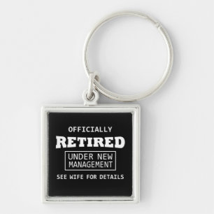 officially retired under new management keychain