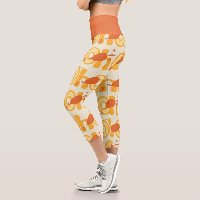 Oh, the Places You'll Go | Orange Text Pattern Capri Leggings (Left)
