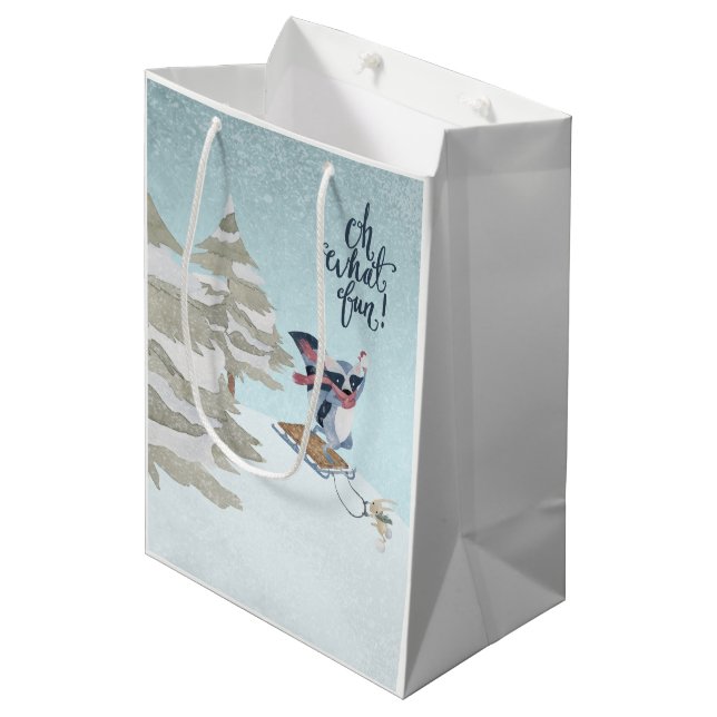 Oh What Fun Christmas Raccoon and Rabbit Sledding Medium Gift Bag (Front Angled)