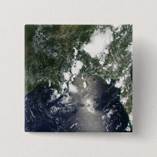 Oil spreads northeast 2 inch square button