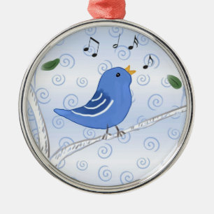 Oiseau bleu mignon de chant sur un ornement de