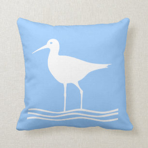 OISEAU DE MER. BLANC sur le coussin bleu