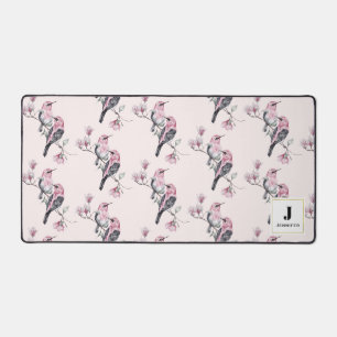 Oiseaux roses et noirs sur un monogramme de branch