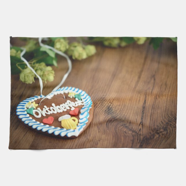 Oktoberfest gingerbread heart with hop on table kitchen towel (Horizontal)