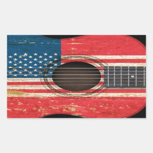 Old Acoustic Guitar with American Flag Sticker