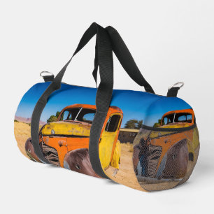 Old and abandoned car in Solitaire, Namibia Duffle Bag