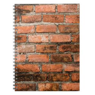 Old and vintage red brick wall texture backgrounda notebook