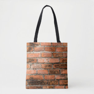 Old and vintage red brick wall texture backgrounda tote bag