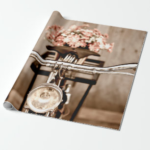Old bicycle and flowers blur in background process wrapping paper
