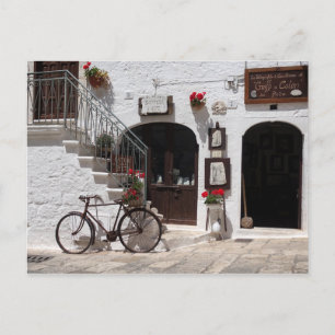Old bike and storefront in Apulia Postcard