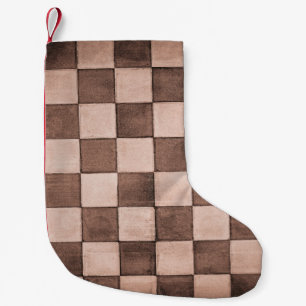 Old black and white tiled stone wall texture backg small christmas stocking