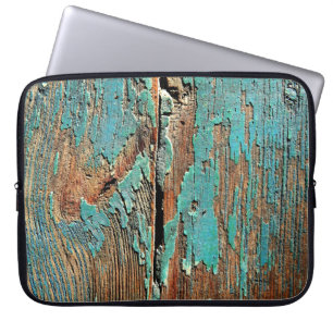 Old blue paint on wood laptop sleeve