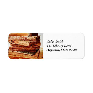 Old books in a stack address label