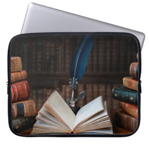 Old books, quill pen and vintage inkwell on wooden laptop sleeve