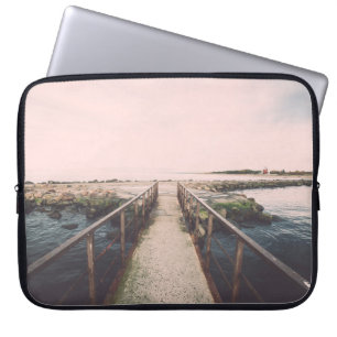 Old bridge with rusty metal rails near sea port. V Laptop Sleeve
