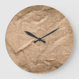 Old brown cloth: textured background. large clock