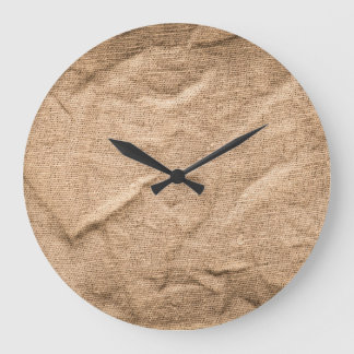 Old brown cloth: textured background. large clock