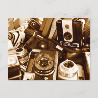Old cameras at thrift shop postcard