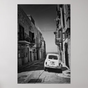 Old car in a street in Italy with sea Poster