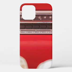 Old car radio inside a red classic American car wi iPhone 12 Case