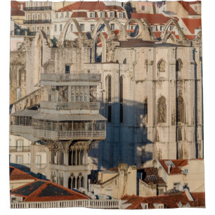 Old city of Lisbon with view tower and church ruin