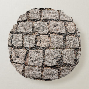Old cobble stone pattern at the streetabstract,anc round pillow