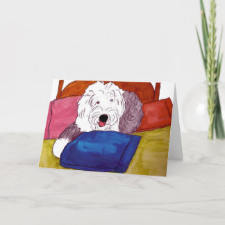 Old English Sheepdog on bed Card